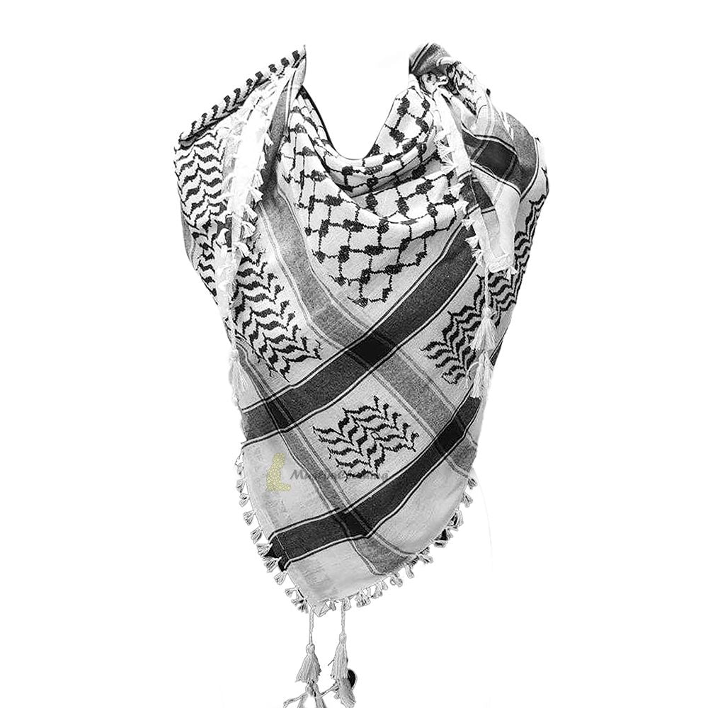 Black and white Palestinian keffiyeh scarf with traditional woven patterns and tassels.