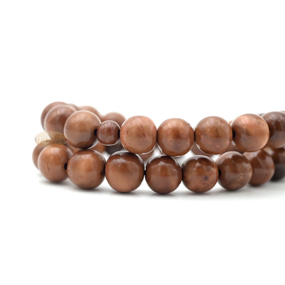 Natural Kuka 8 mm Palm Seed Tasbih – 33-bead with Brown Yarn Stops