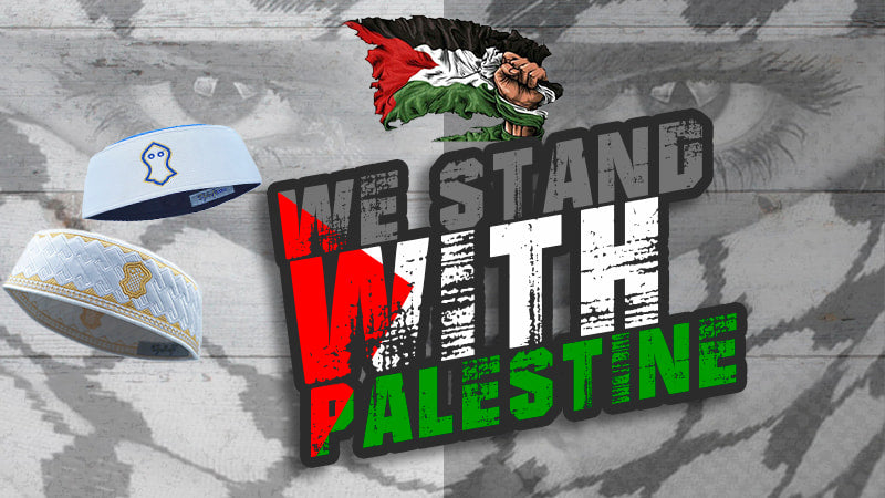 We Stand With Palestine banner featuring Palestinian flag artwork, raised fist graphic, and two embroidered Islamic kufi caps.