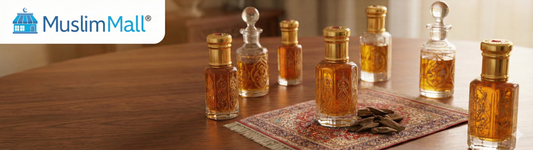 MuslimMall blog banner featuring ornate glass Attar perfume bottles, a miniature prayer rug, and agarwood chips on a wooden table.