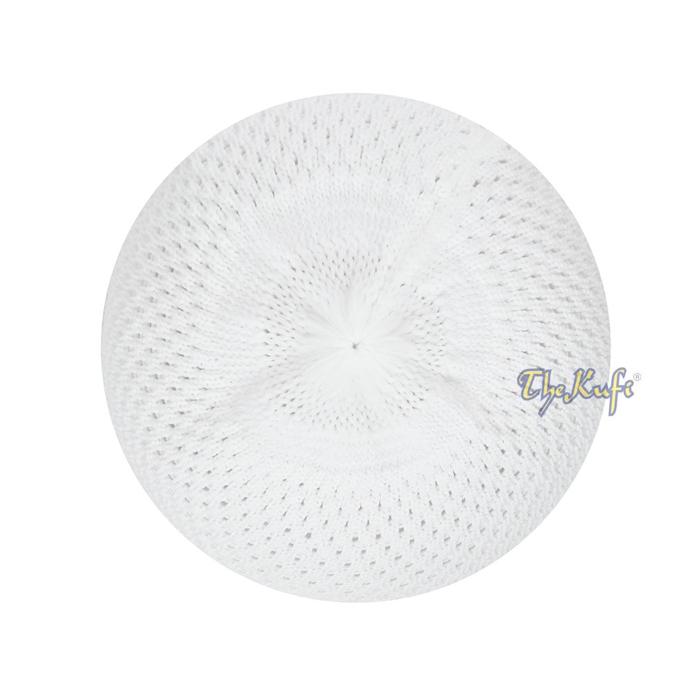 White knitted Islamic prayer cap (kufi) with breathable mesh pattern.