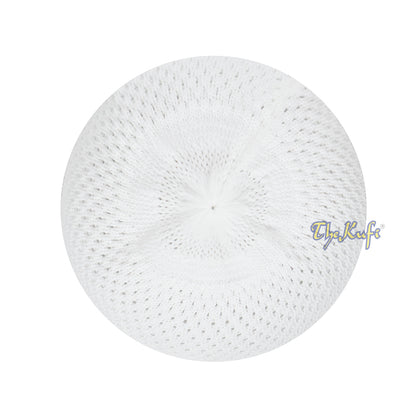 White knitted Islamic prayer cap (kufi) with breathable mesh pattern.
