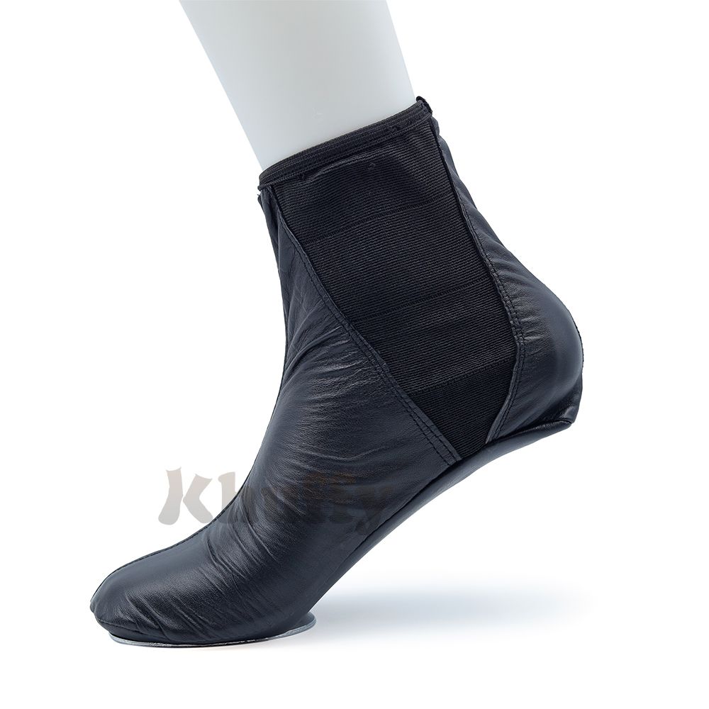 Black leather khuff socks for wudu and Islamic ablution, shown on a mannequin foot.