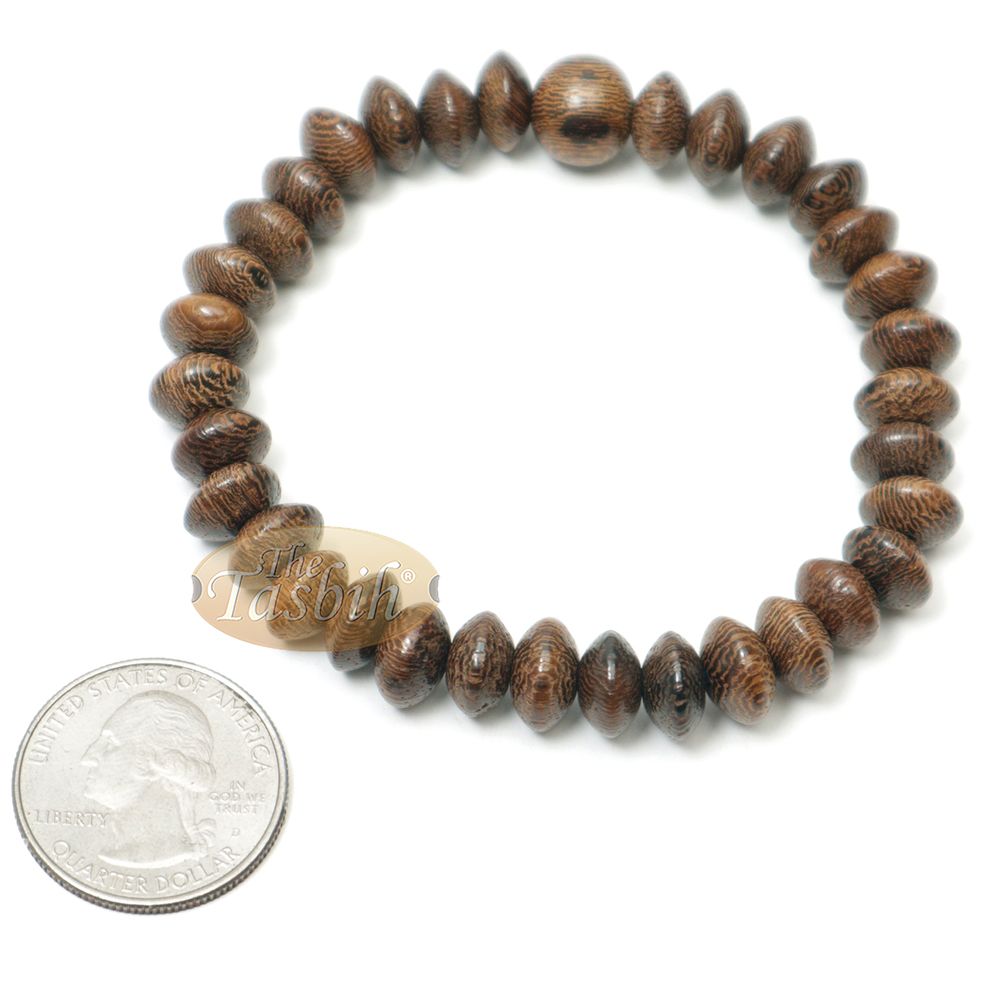 Brown wooden tasbih bracelet with oval textured beads from TheTasbih.com.