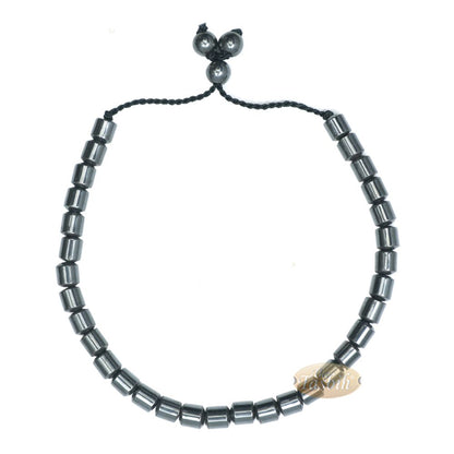 Black cylindrical-bead Islamic tasbih bracelet with adjustable cord.