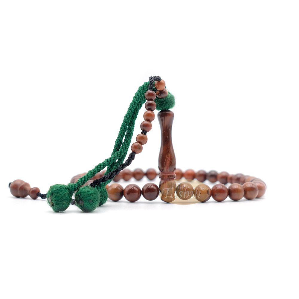 Natural Kuka 8 mm Palm Seed Tasbih – 33-bead with Green Yarn Stops