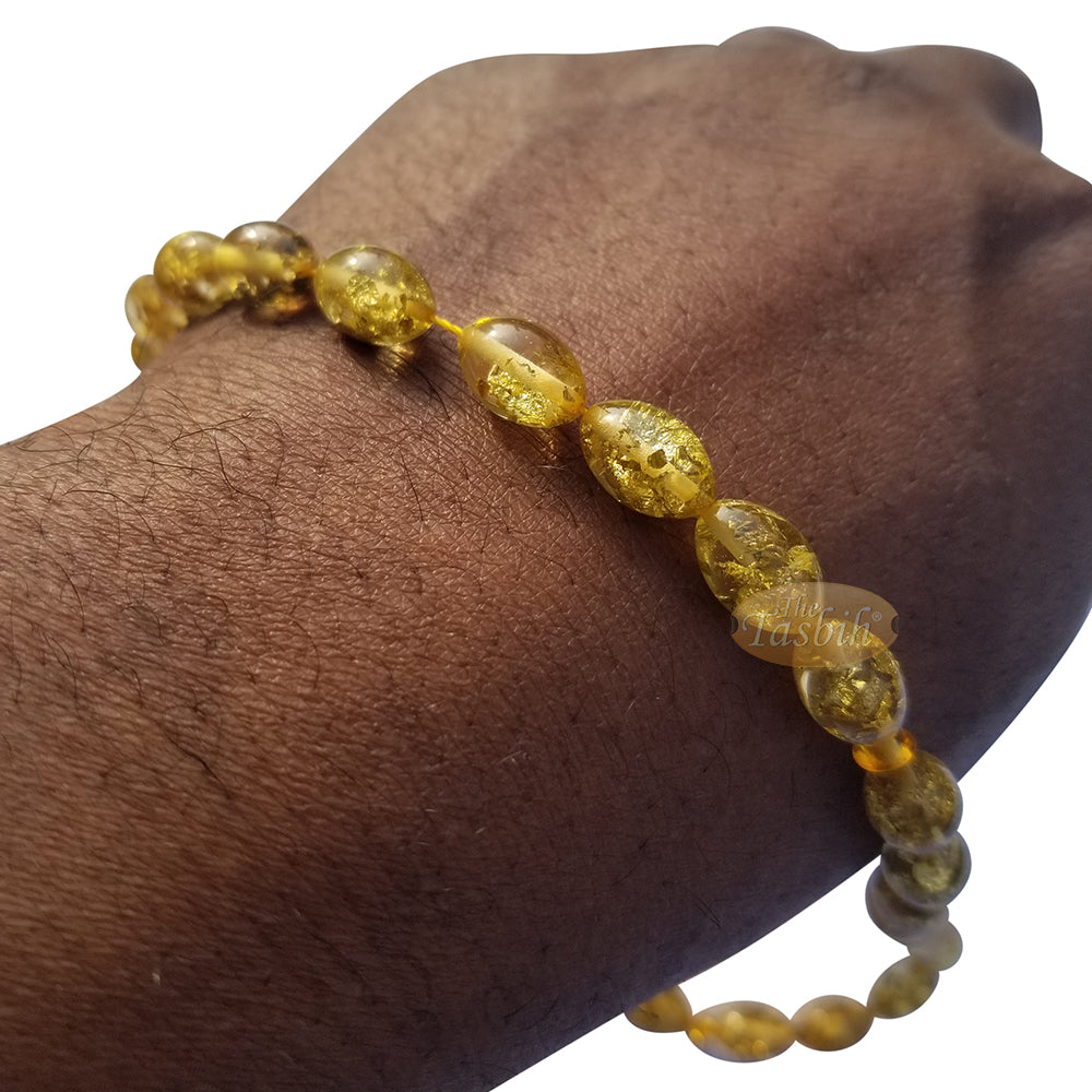 Tasbih Akrilik Oval Kecil 33 Butir Serpihan Daun Berwarna Emas Beraksen 2 Simpul Perak pada Rantai Ekor Rubah