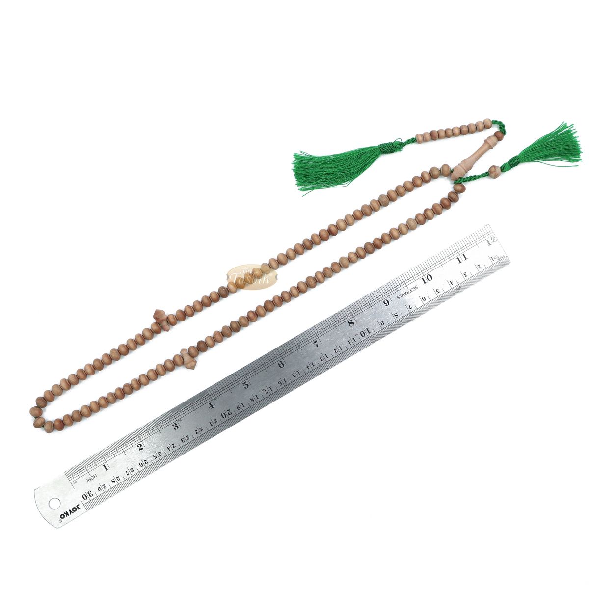 Wooden Islamic misbaha prayer beads with green tassels.