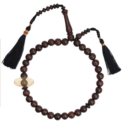 Tasbih dari Kayu Asam Jawa dengan Rumbai Berhias Warna Hitam