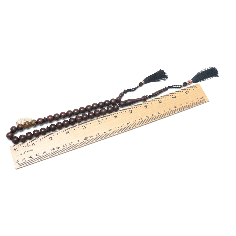 Tasbih dari Kayu Asam Jawa dengan Rumbai Berhias Warna Hitam