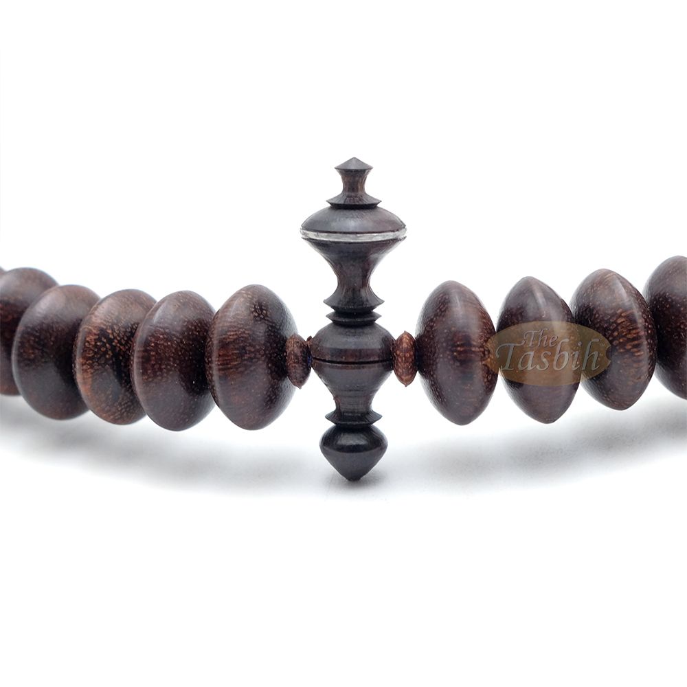 Hardwood Tijani Misbaha | Limited Edition Ain Madhi Dark Brown Tamarind Core Wood 14×8 mm Pewter Inlay 100-Bead Tasbih